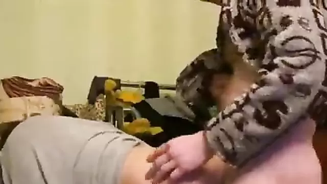 A man in a robe penetrates a Russian wife with doggy style sex